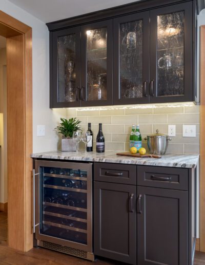 A wine cooler in a kitchen.